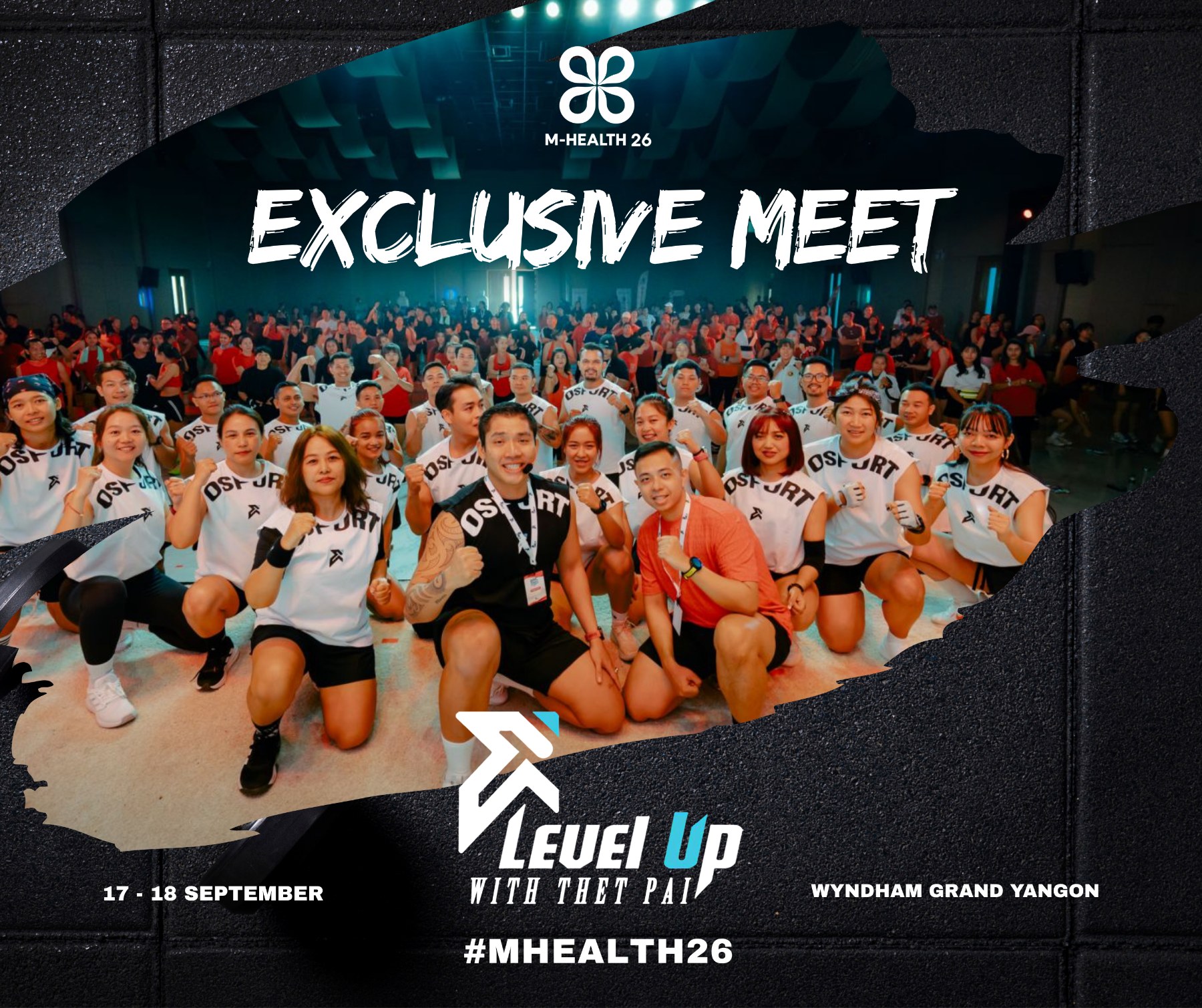 Ko Thet Paing and the Level Up Team with a large group fitness community